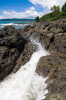 Costa Rica, Gischt zwischen zwei Felsen an der traumhaft schnen Playa Cocalito