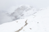 Italien, Sdtirol, Dolomiten: Der verschneite Weg nach Wolkenstein. Solch ein Wetter kann einen hier auch im Hochsommer ereilen.